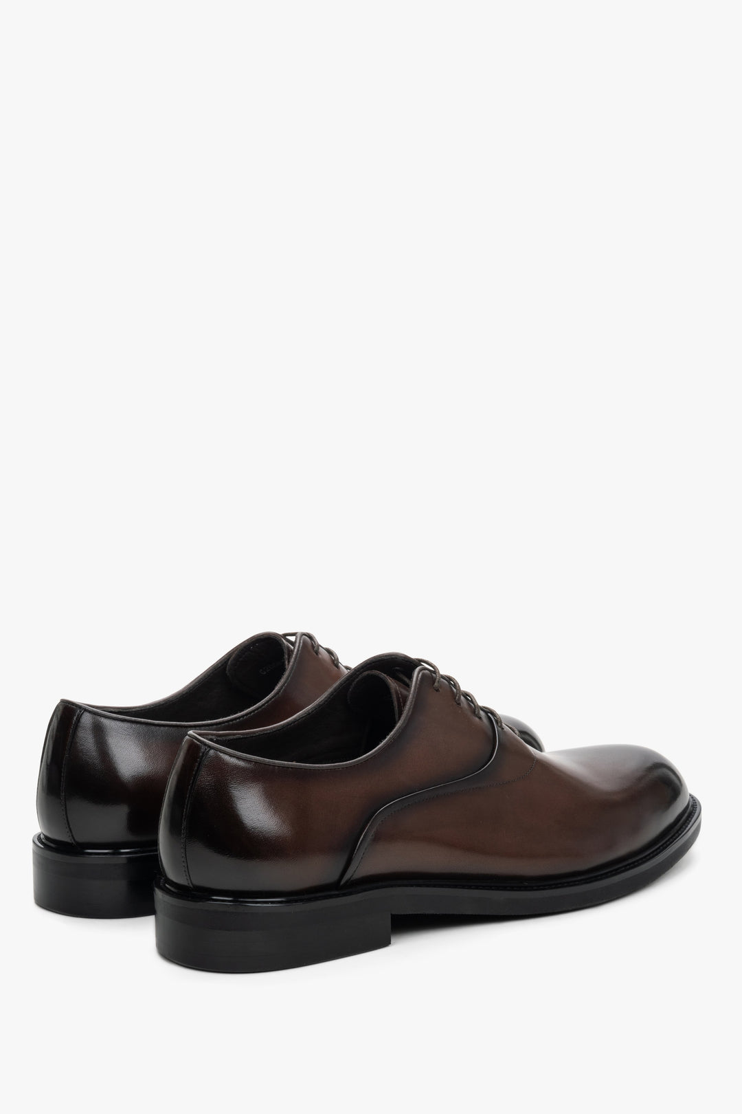 Men's brown leather Oxford shoes by Estro - close-up on the side line and heel counter.