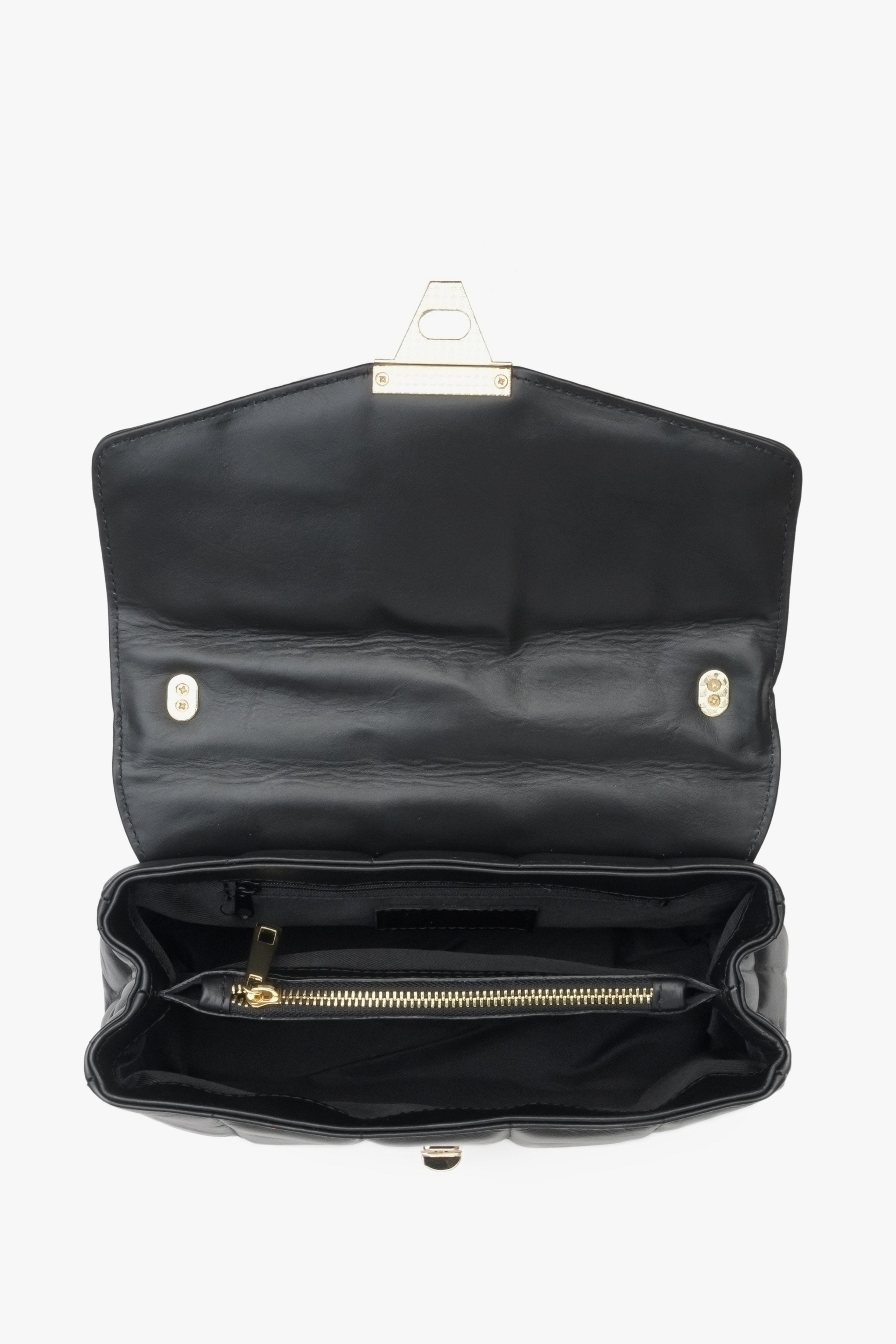 Elegant black leather women's handbag by Estro -  close up on the lining.