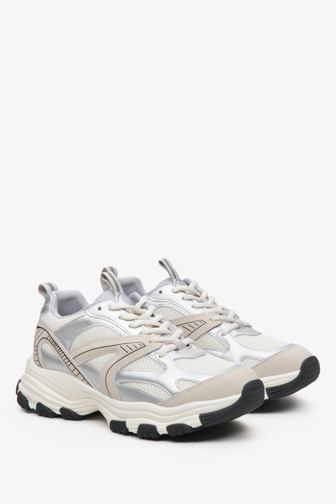 ES8 women's sporty light beige sneakers with silver accents.