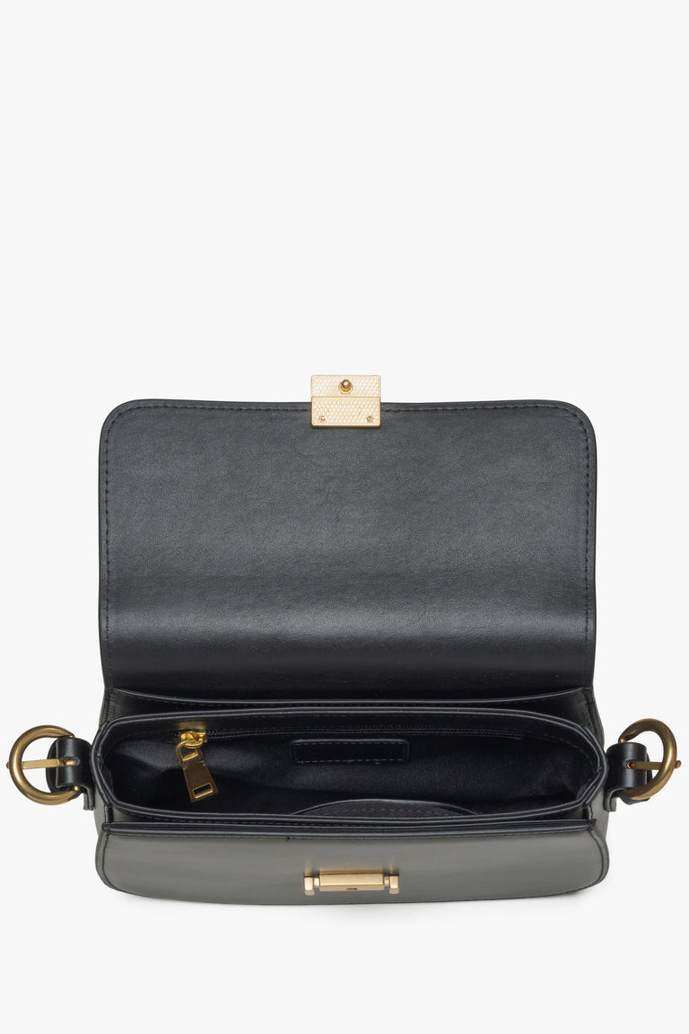 Estro women's small black leather handbag - close-up of the interior.