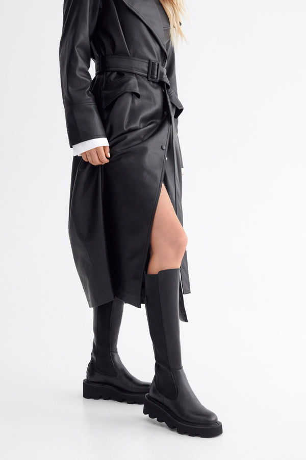 Women's Estro black leather knee-high boots.