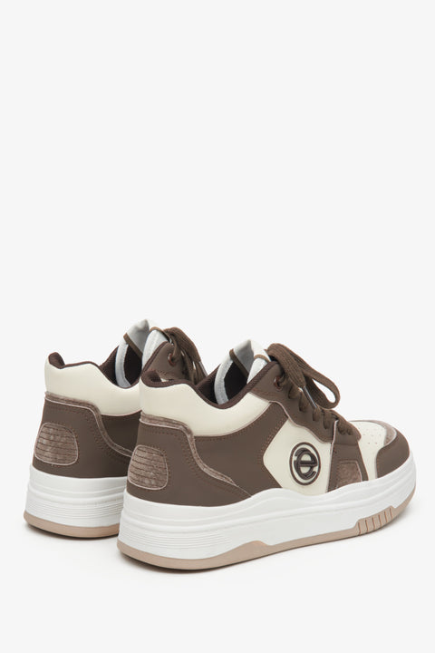 High-top women's sneakers by Estro in brown and beige - close-up on the heel counter and side line of the shoe.