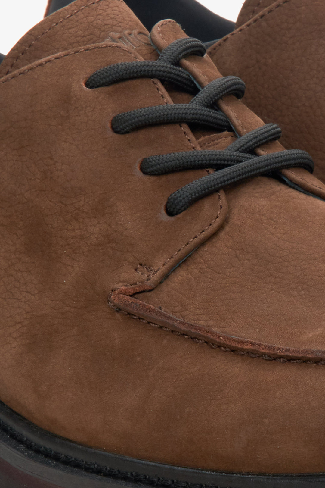 Men's dark brown nubuck loafers by Estro - close-up on the details.