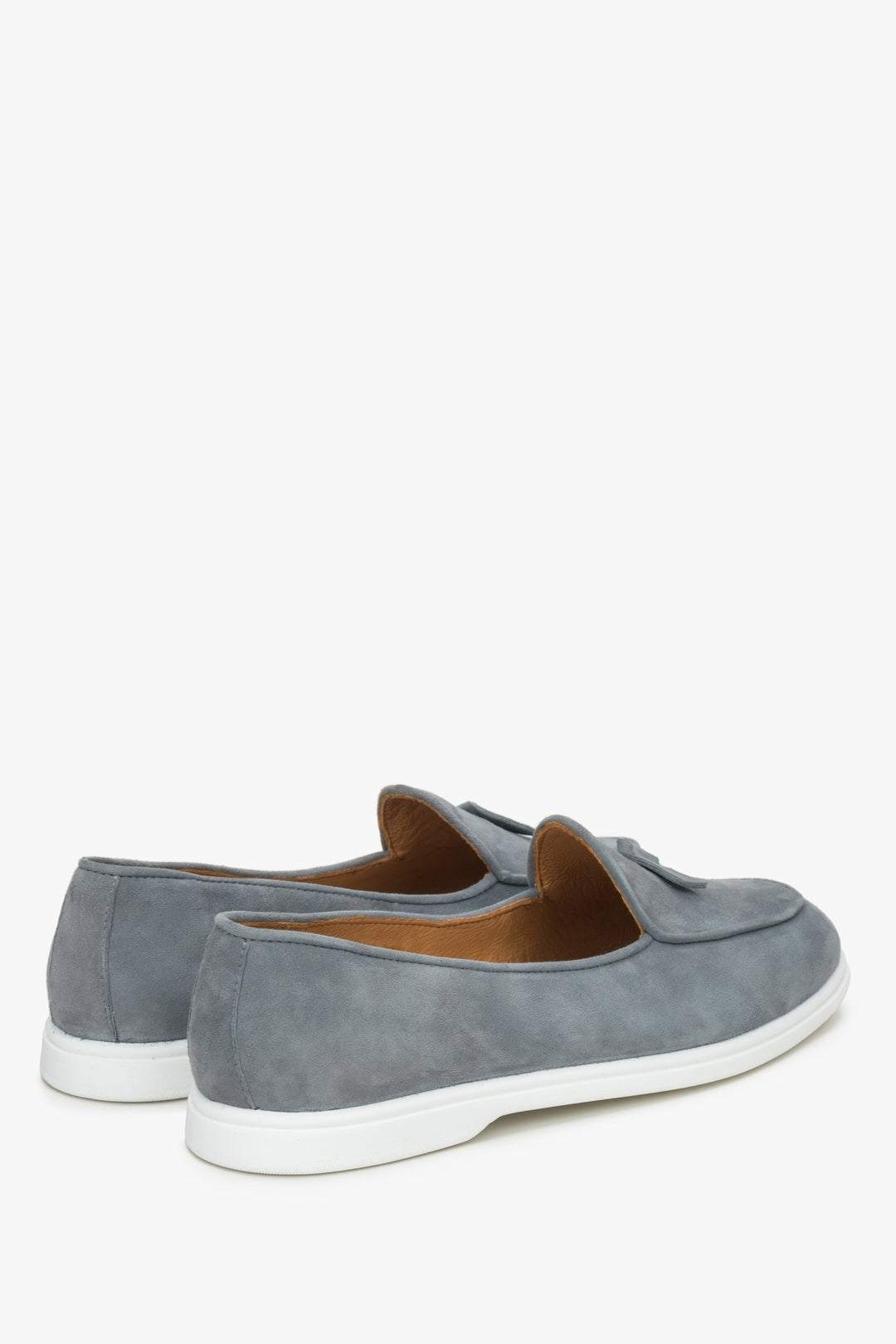 Women's grey velour loafers by Estro - close-up on the heel counter and side profile of the shoes.