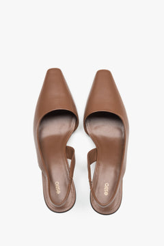 Elegant women's brown slingback pumps with a low heel, made of soft natural velour by Estro.