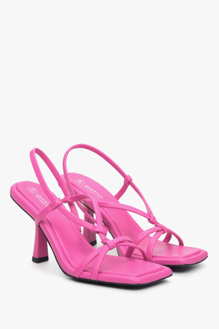 Pink leather funnel heel sandals.