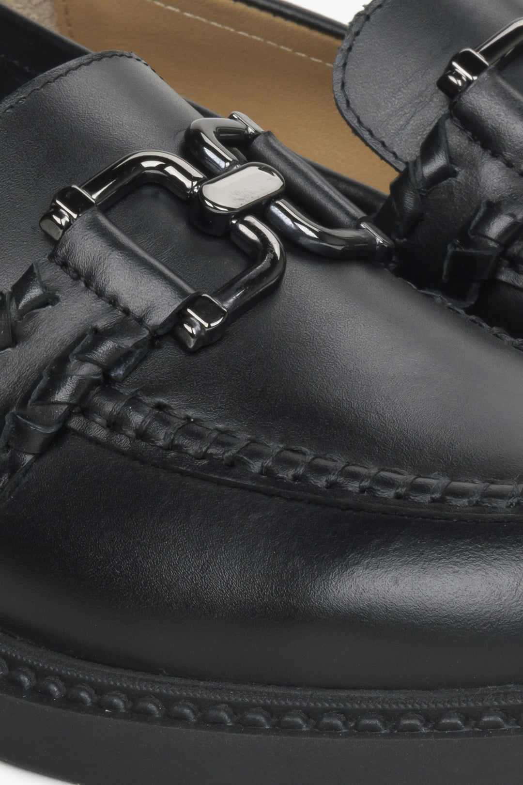 Estro women's black loafers - close-up on details.