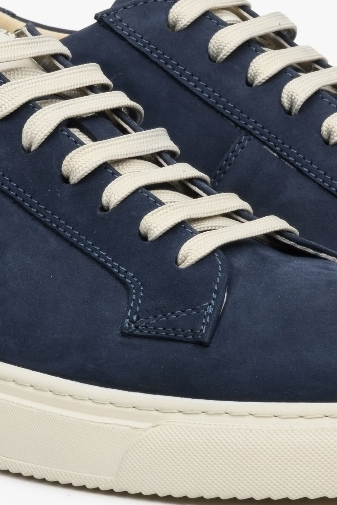 Men's navy blue nubuck sneakers for spring - a close-up of the sewing system.