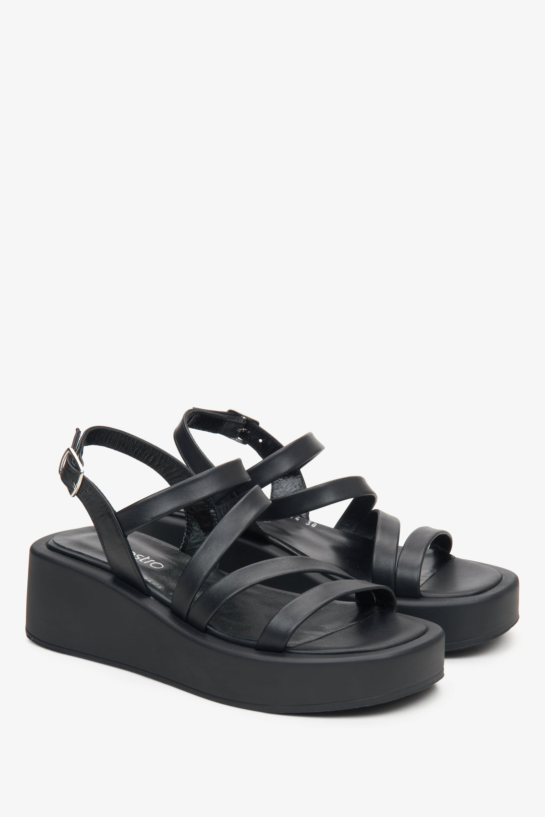 Women's leather wedge sandals by Estro in black colour.