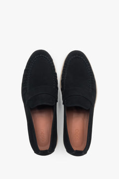 A pair of men's classic black loafers, crafted from soft genuine velour.