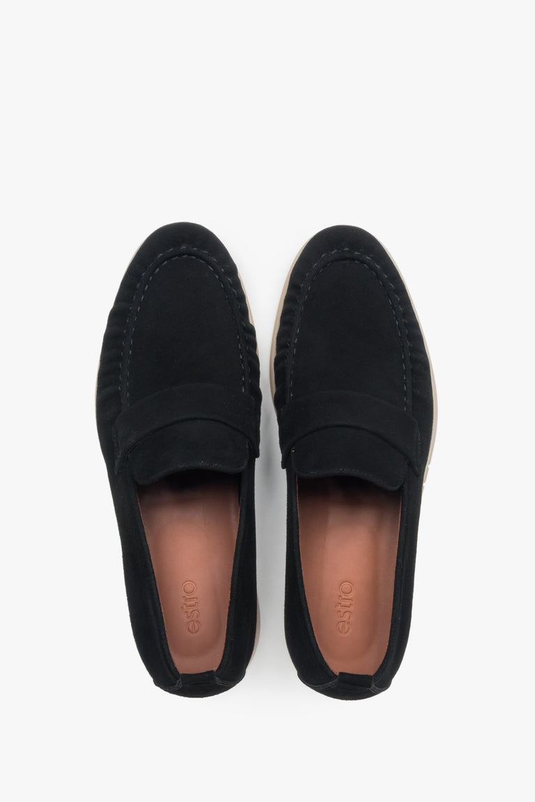 A pair of men's classic black loafers, crafted from soft genuine velour.