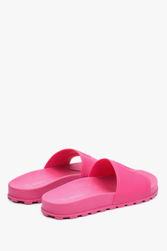 Women's pink rubber flip-flops for fall/spring by Estro.