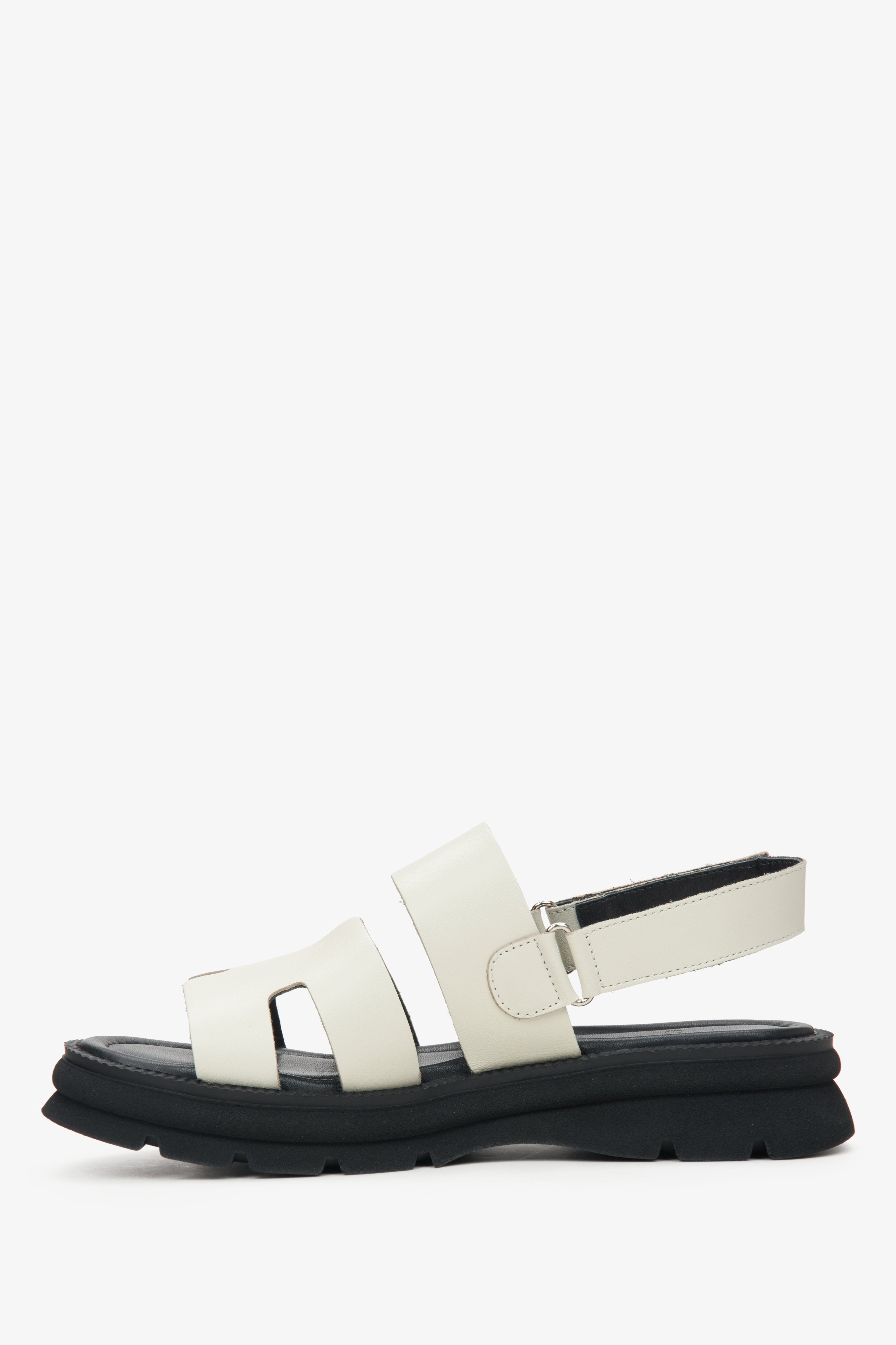 Women's white sandals made of genuine leather by Estro - shoe profile.