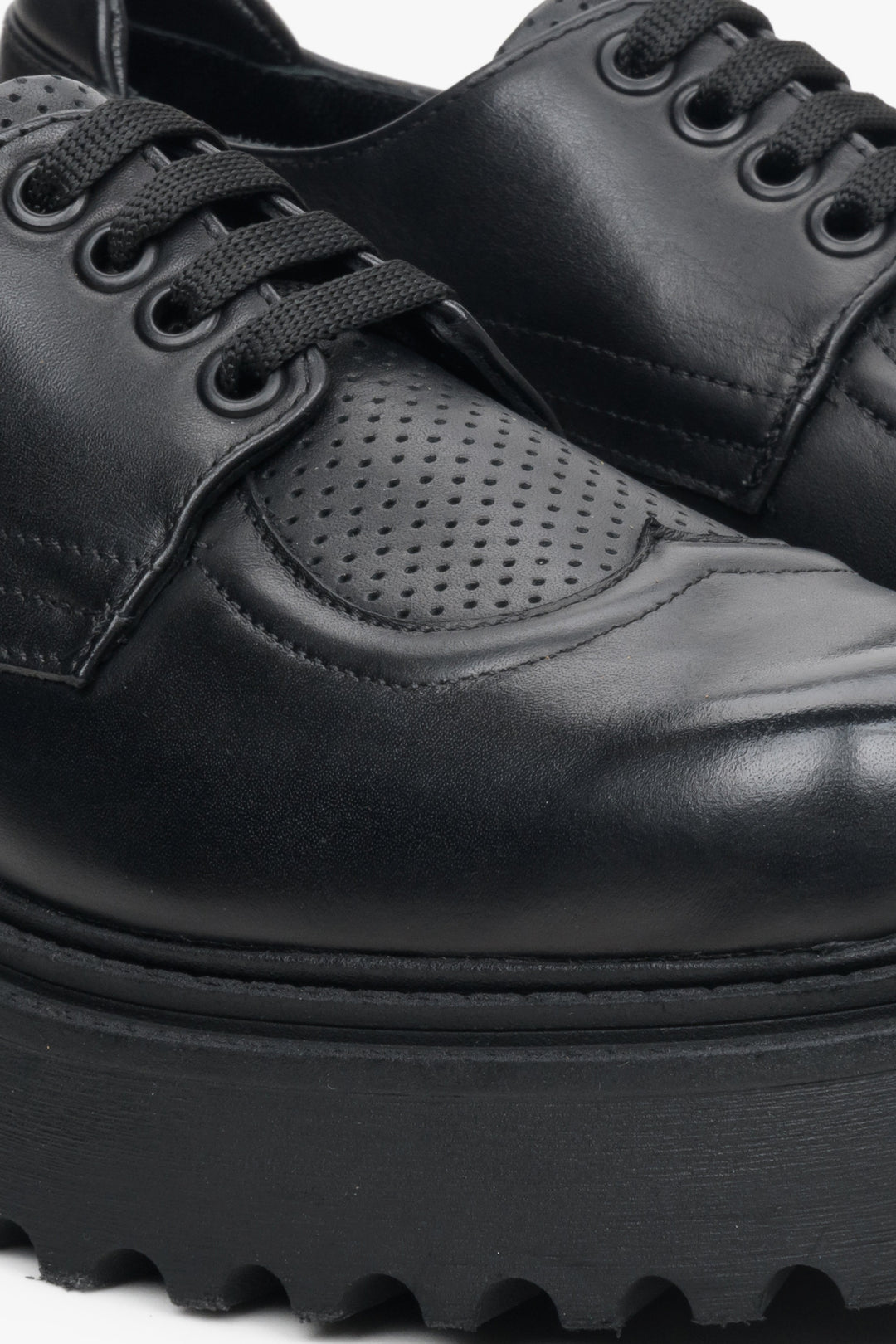 Women's black lace-up leather shoes by Estro - close-up on details.