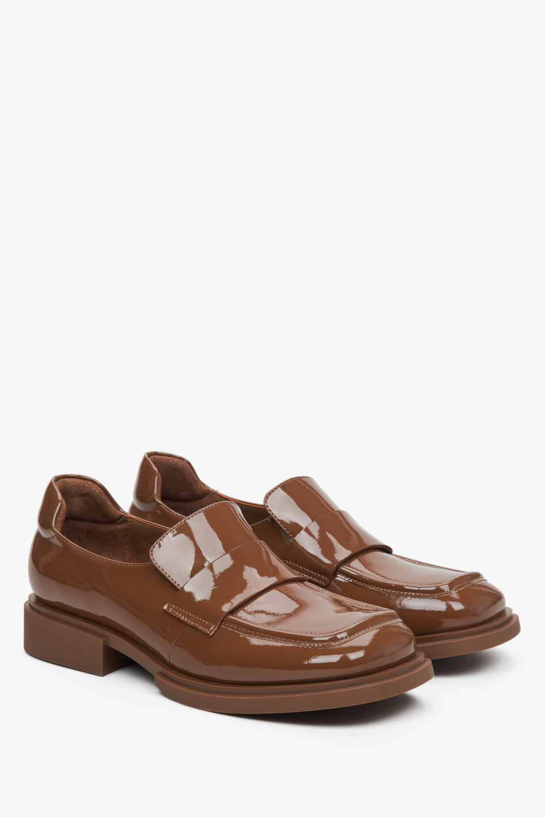 Women's brown moccasins made of patent genuine leather by Estro.