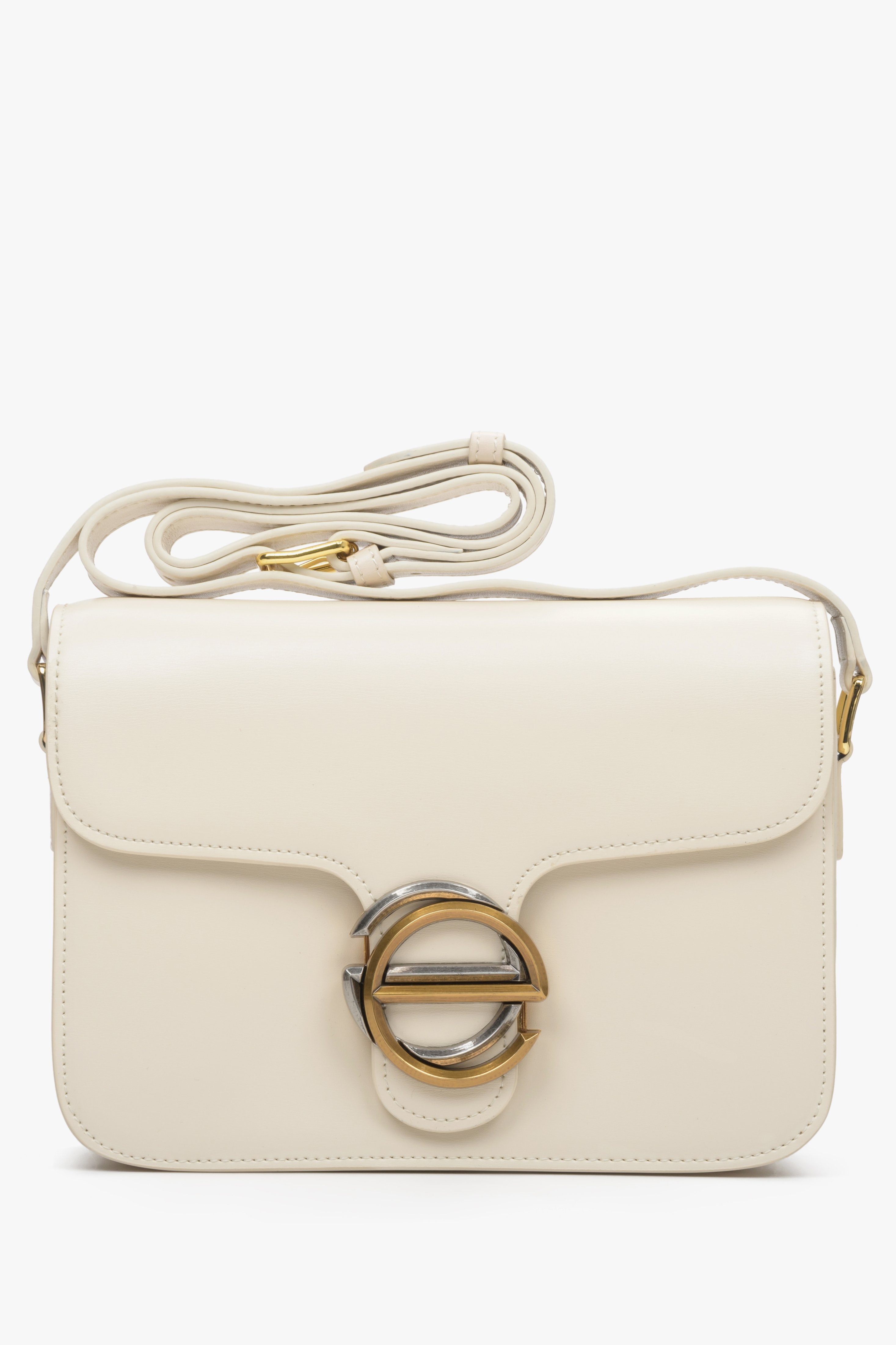 Women's small light beige handbag with gold hardware made of leather by Estro.