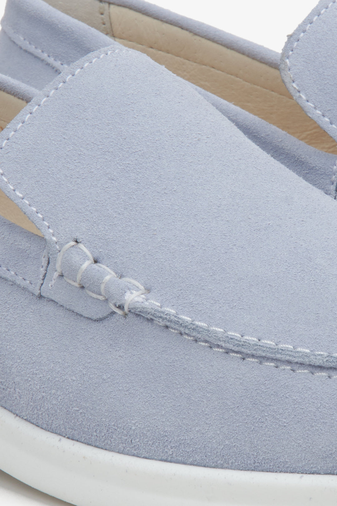 Women's light blue suede Estro moccasins - close-up of the sewing system.