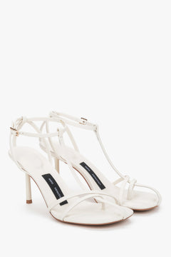 Pair of cream beige leather sandals with delicate straps by Estro Selection