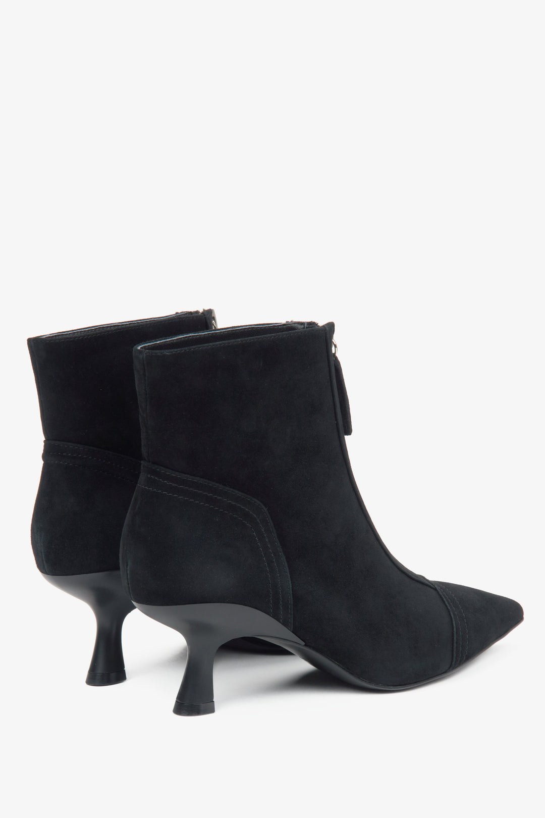 Black women's ankle boots with a low stiletto heel made of natural velour by Estro – heel and stiletto close-up.