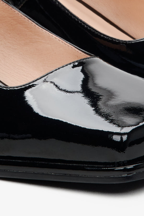 Women's black leather Mary Jane pumps - close-up on details.