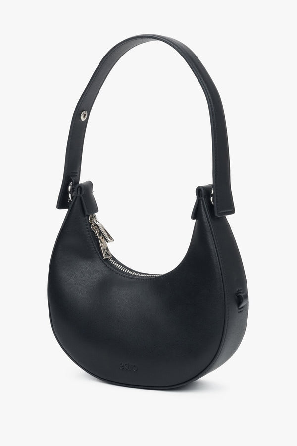 Stylish black women's handbag in a crescent shape, from Estro.