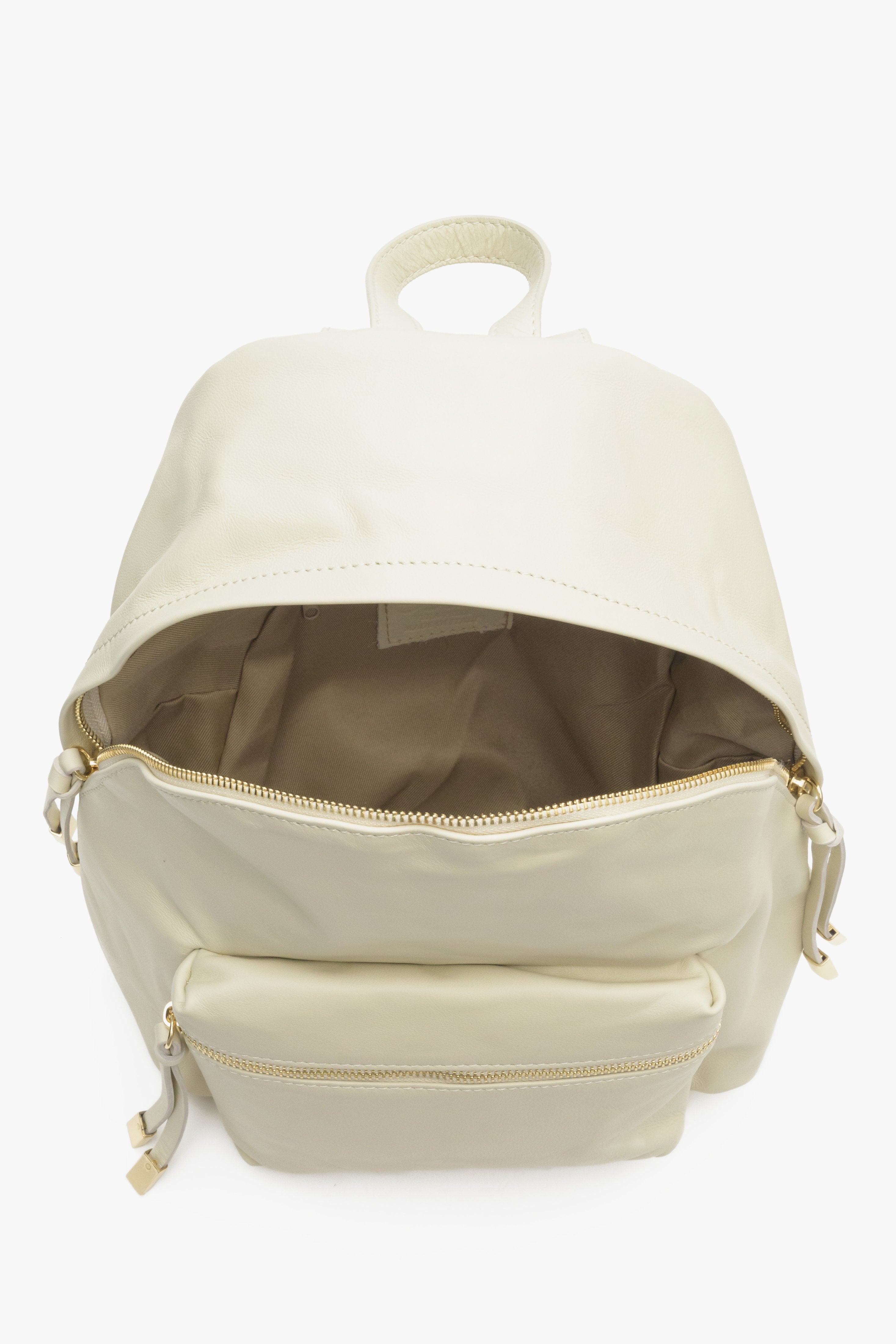 Elegant and capacious women's light beige backpack purse Estro - close-up on the lining.