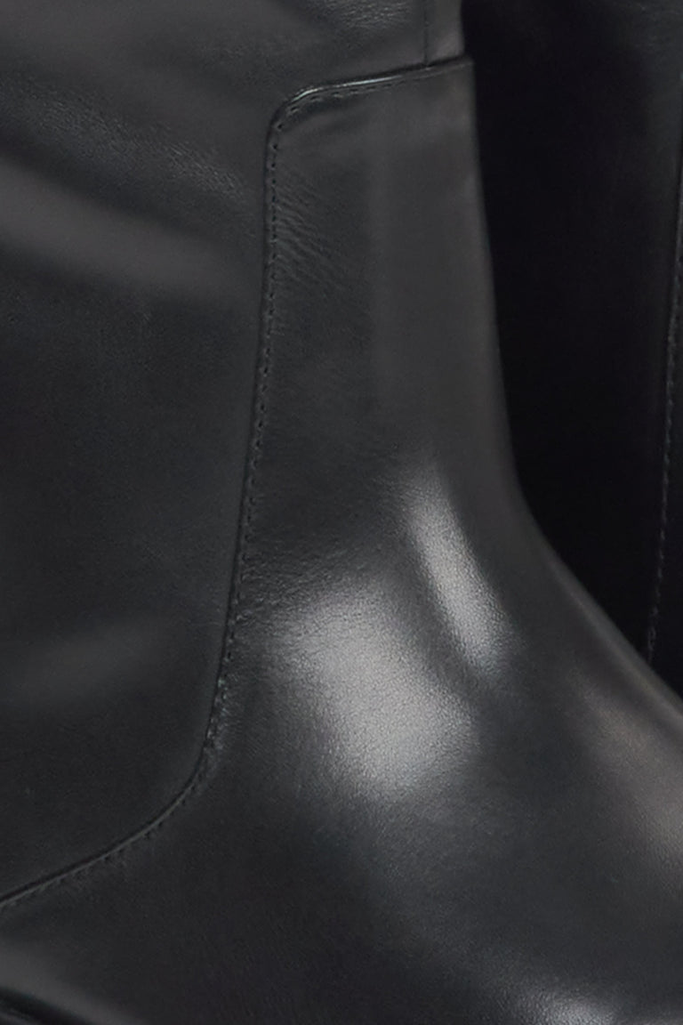 Black high women's boots Estro made of natural leather - close-up of details.