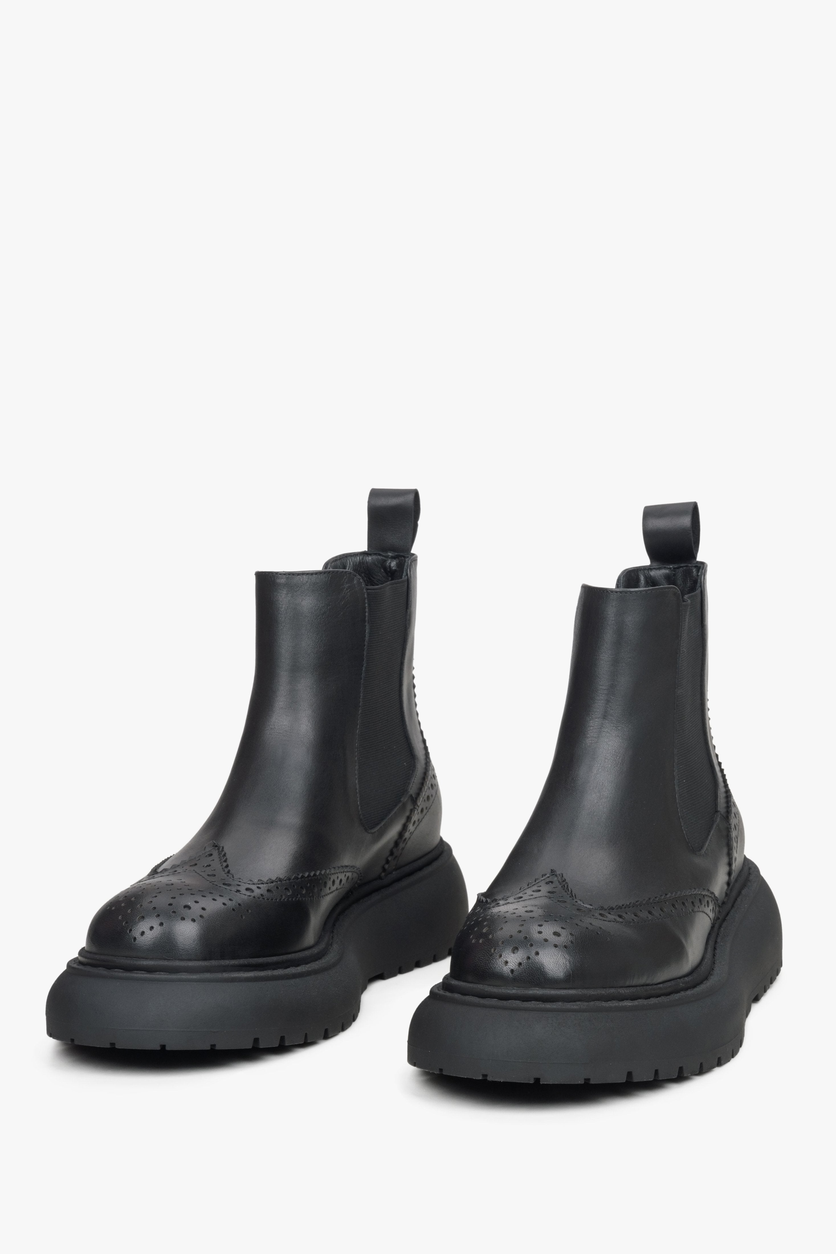 Women's black leather chelsea boots.