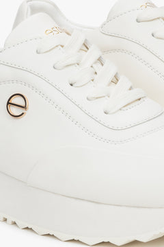 White leather women's sneakers by Estro – close-up on the details.