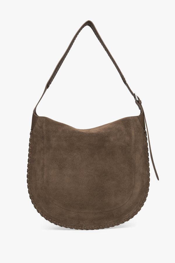 A women's shoulder bag constructed from genuine suede in a dark beige color.