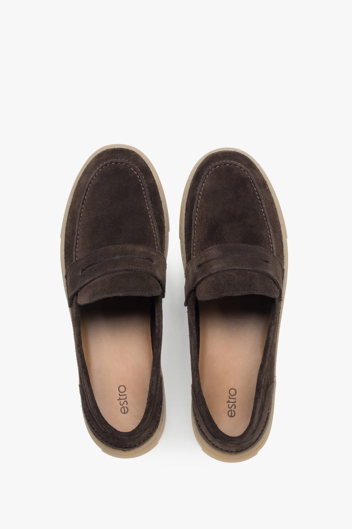 Side profile of a men's dark brown loafer, showing the premium Italian velour and the design of the flexible sole.