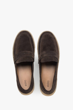 Side profile of a men's dark brown loafer, showing the premium Italian velour and the design of the flexible sole.
