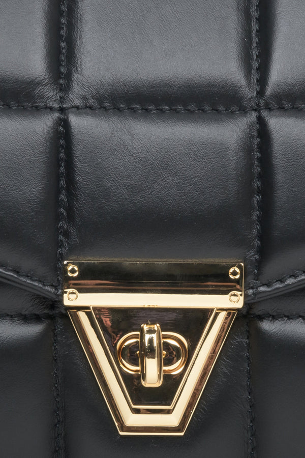 Women's black handbag made in Italy - close-up on details.