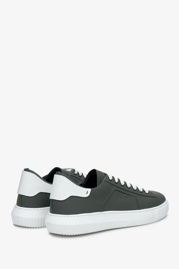 Men's green leather sneakers for spring and fall - prezentation of the shoe side and heel counter.