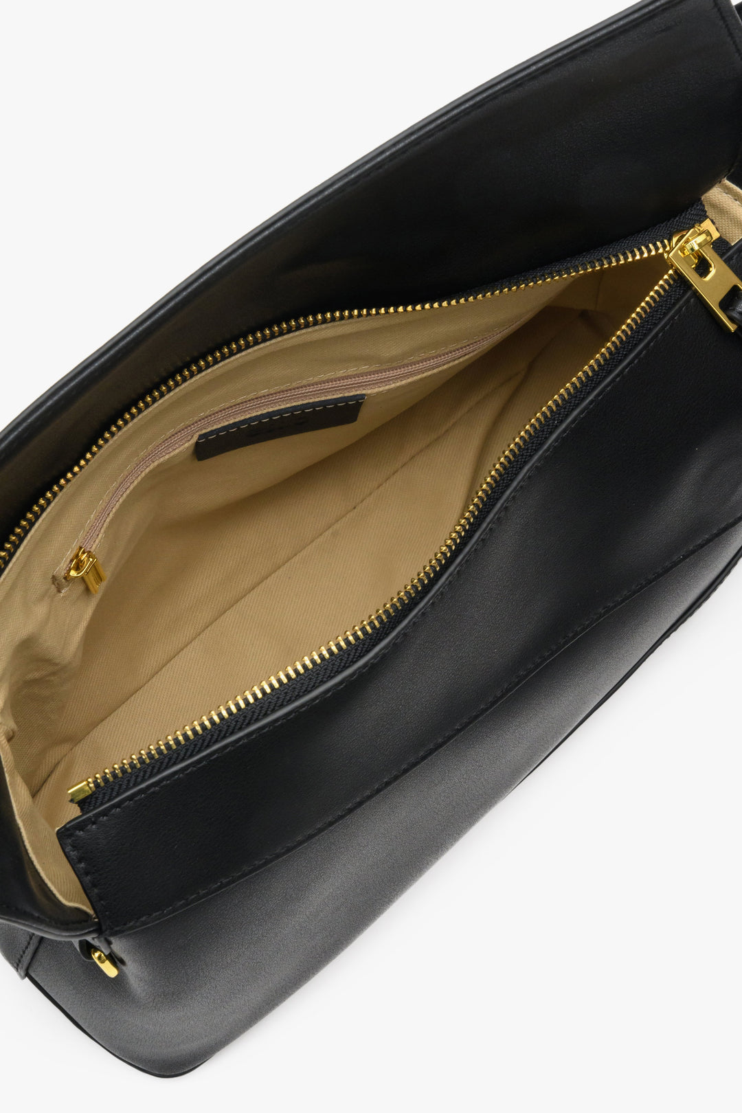 Women's leather black handbag by Estro - close-up on the interior.