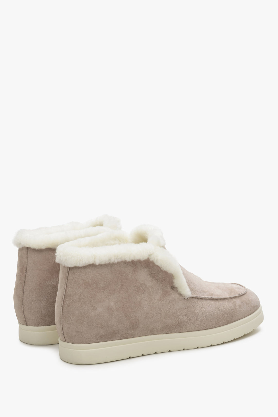 Slip on low-top boots in pale pink colour made of velour and fur.