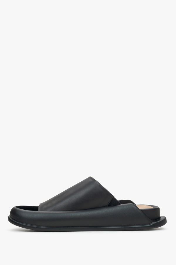 Women's black slide sandals made of soft genuine leather by Estro - shoe profile.