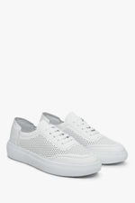 Women's white  leather sneakers with genuine leather perforation by the Estro brand - presentation of the side and front lines of the footwear.