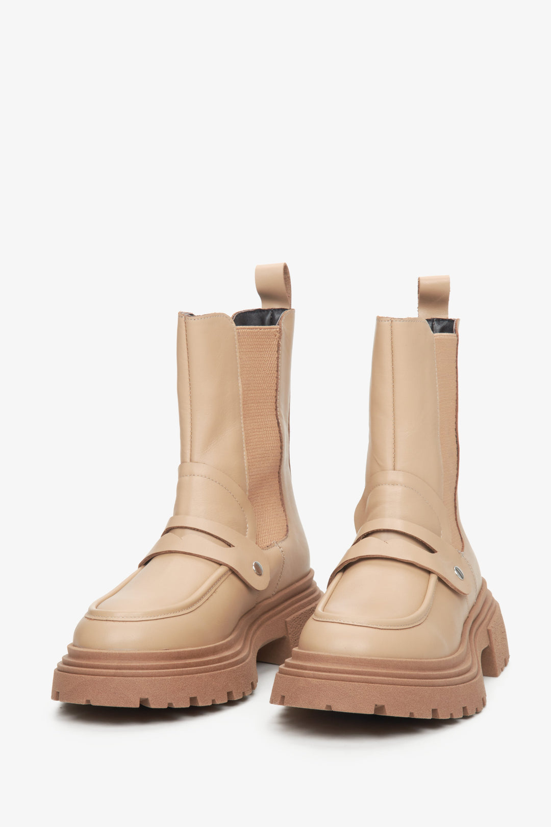 Women's beige leather Chelsea boots by Estro - close-up on the front of the model.