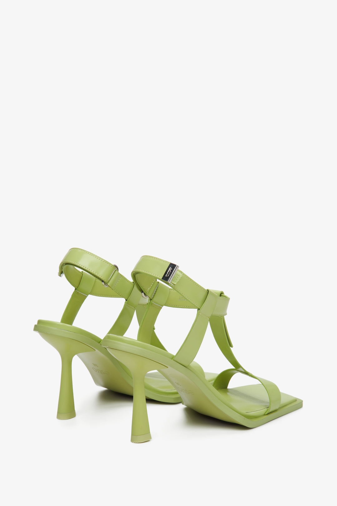 Light green women's heeled t-bar sandals, Estro brand.