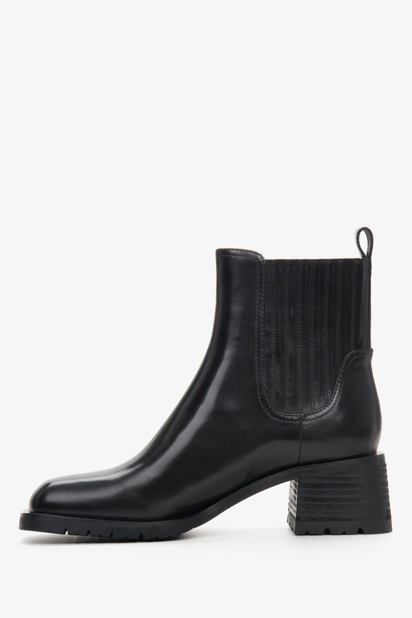 Women's black leather chelsea boots - shoe profile.