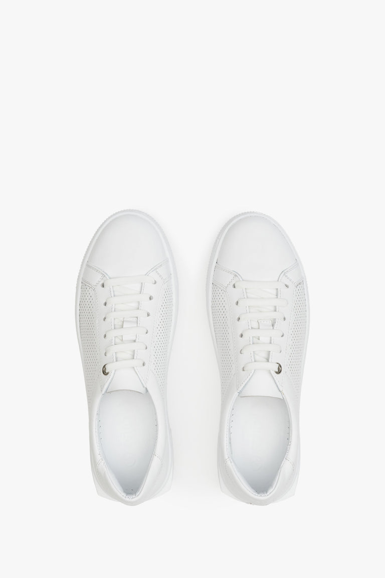 Perforated women's white sneakers made of genuine leather by Estro - presentation of the footwear from the top.