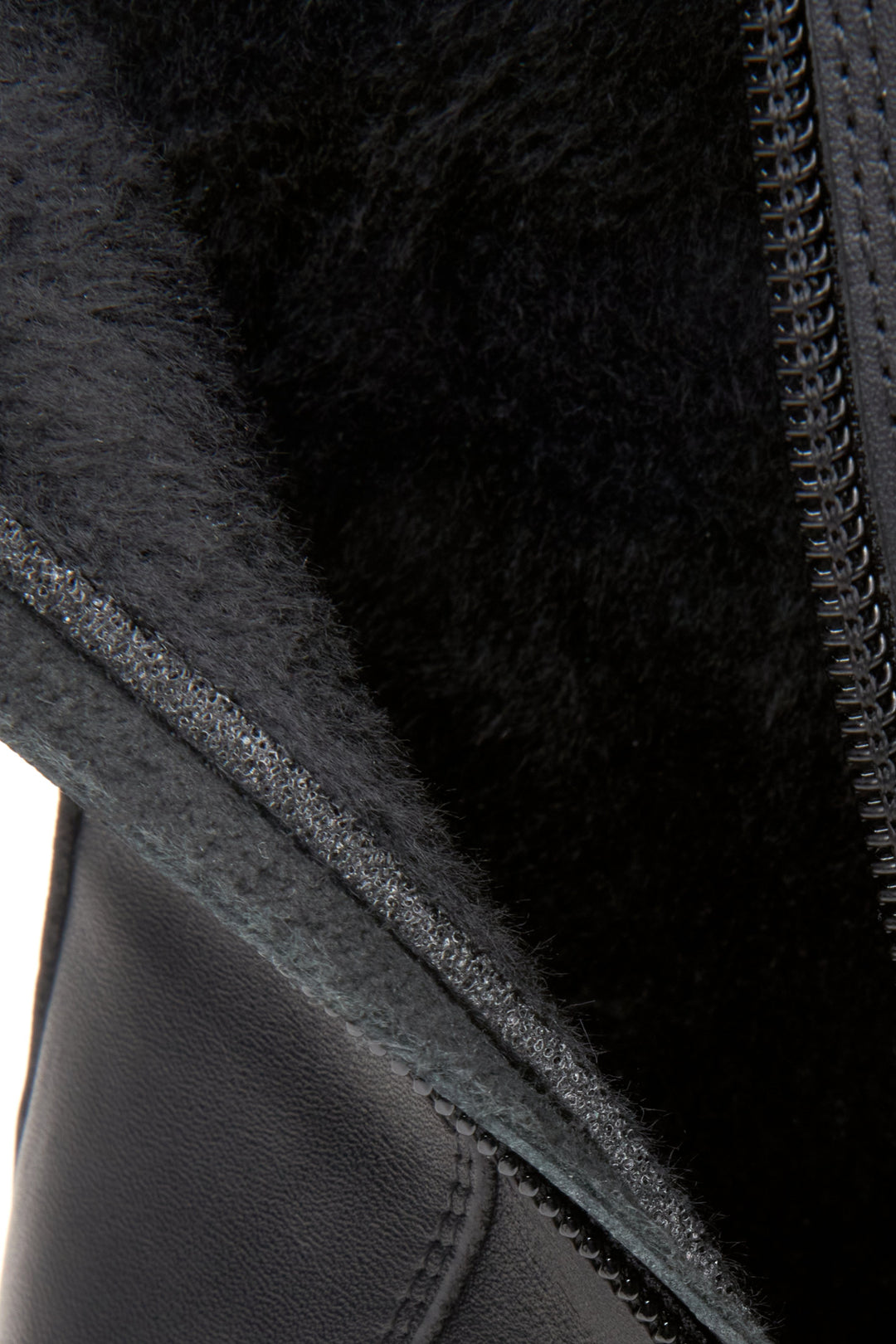 Women's elevated black boots in genuine leather by Estro - close-up on the interior of the boot.