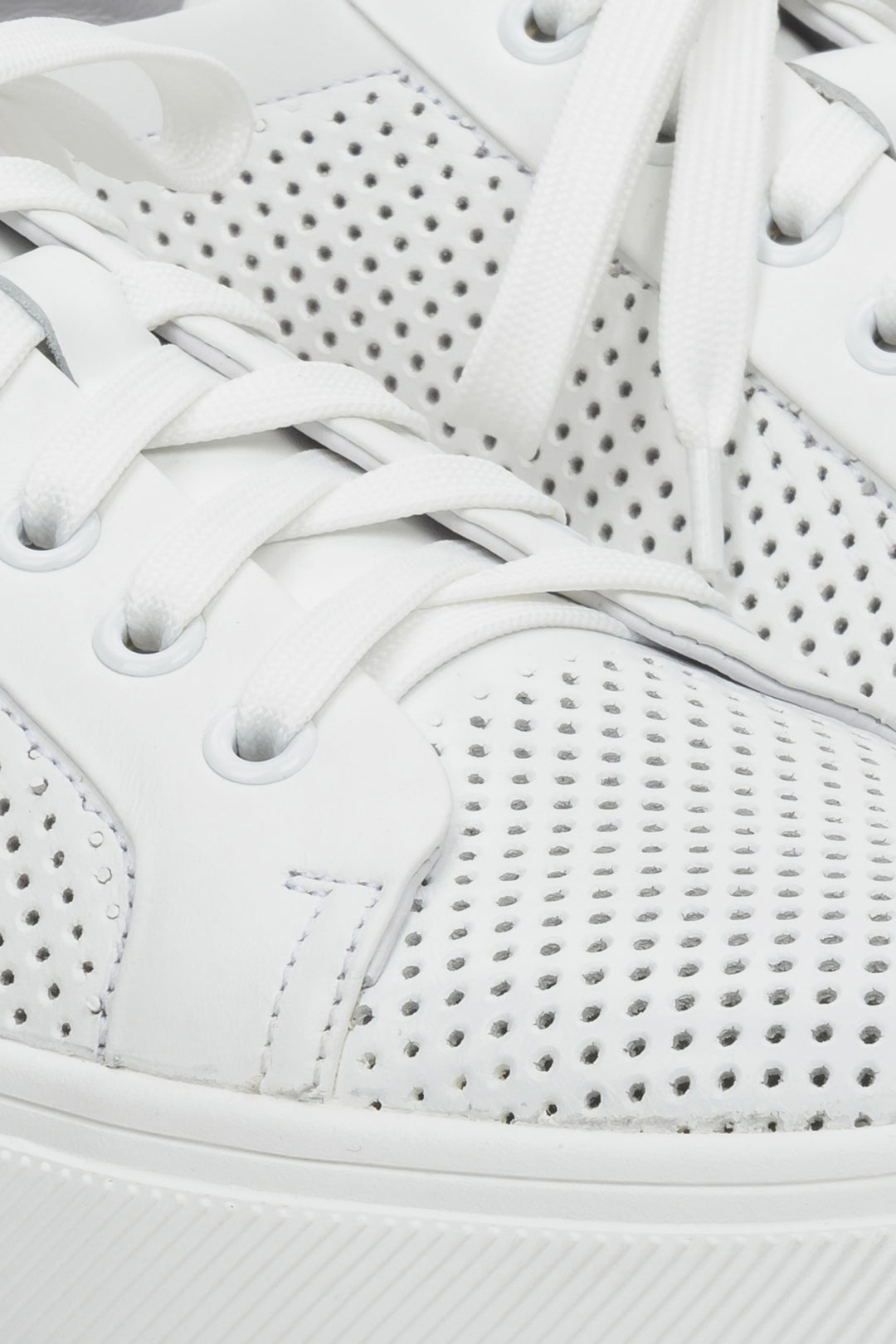 Men's Estro sneakers with perforation and laces for summer - close-up on the details.