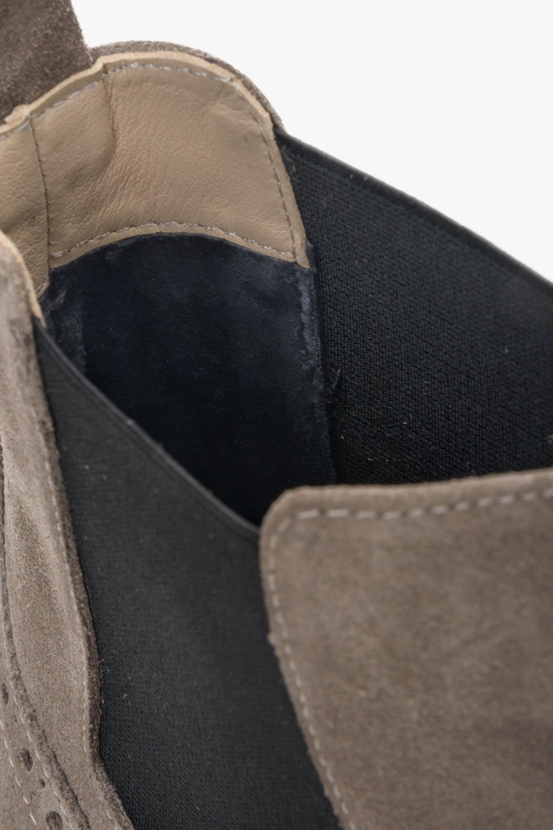 Women's taupe suede ankle boots by Estro - close-up on the details.