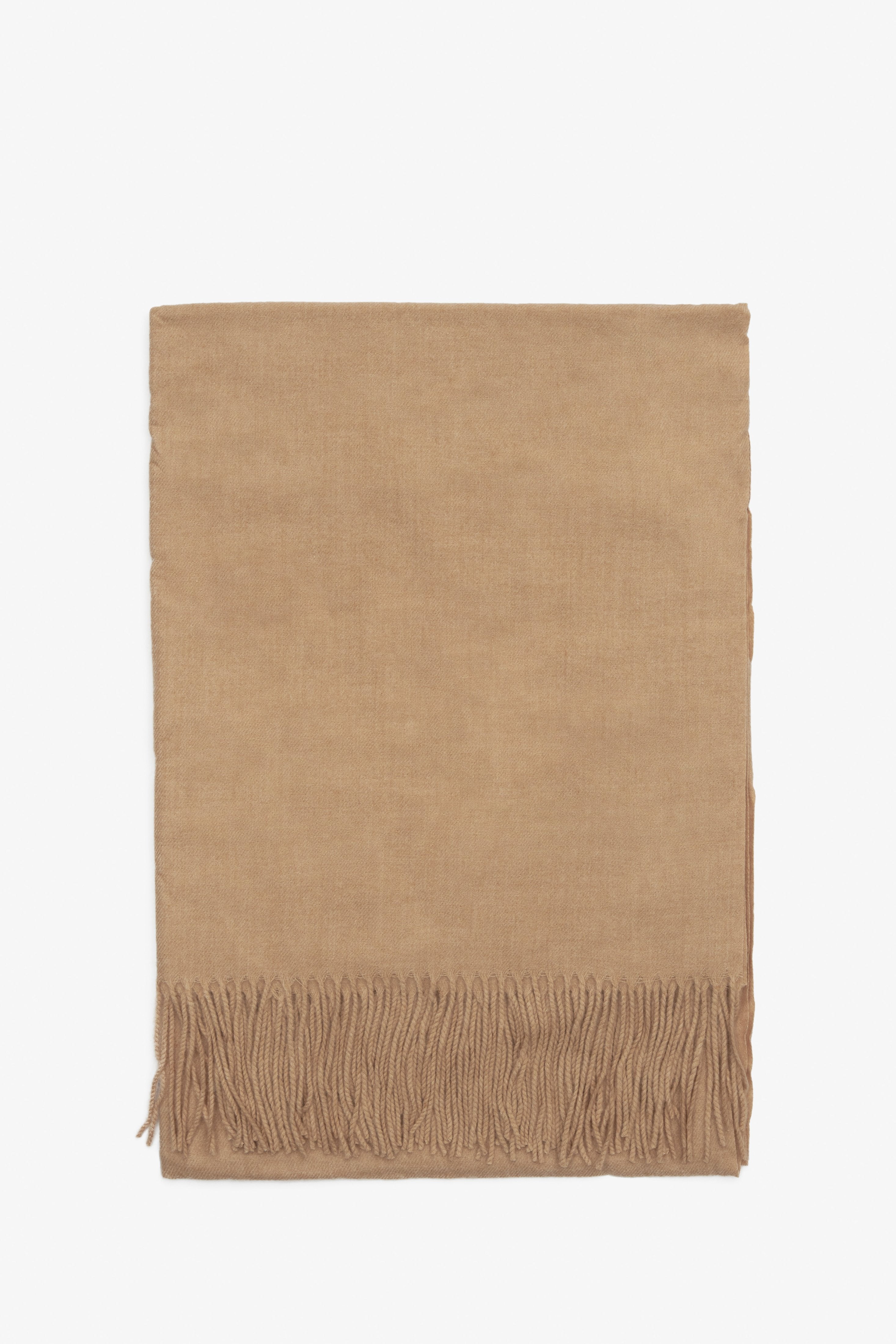 Women's beige scarf by Estro.