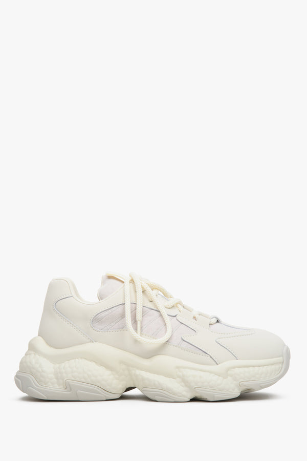 Light beige and textile women's sneakers with lacing on a chunky sole - shoe profile.