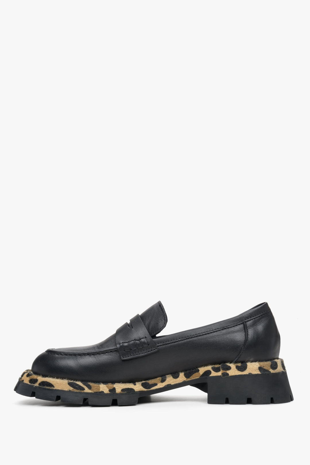Women's black leather moccasins with an animal print pattern by Estro - shoe profile.