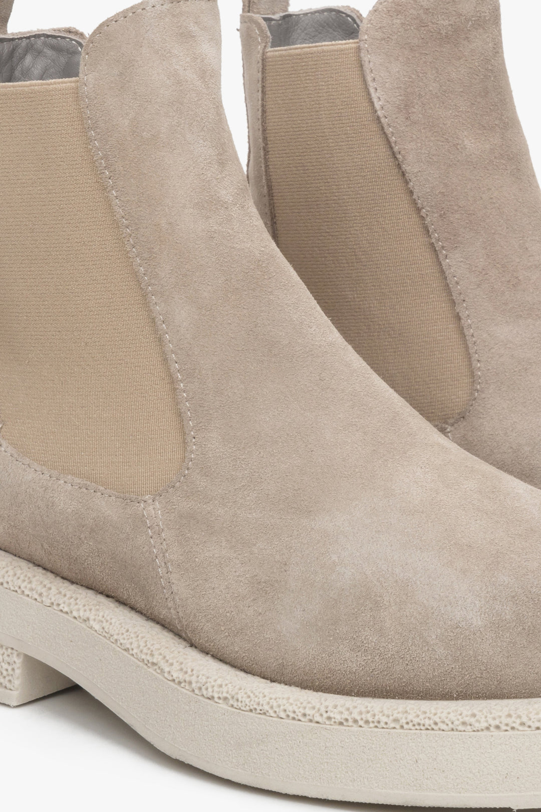 Beige suede women's Chelsea boots - a close-up on details.