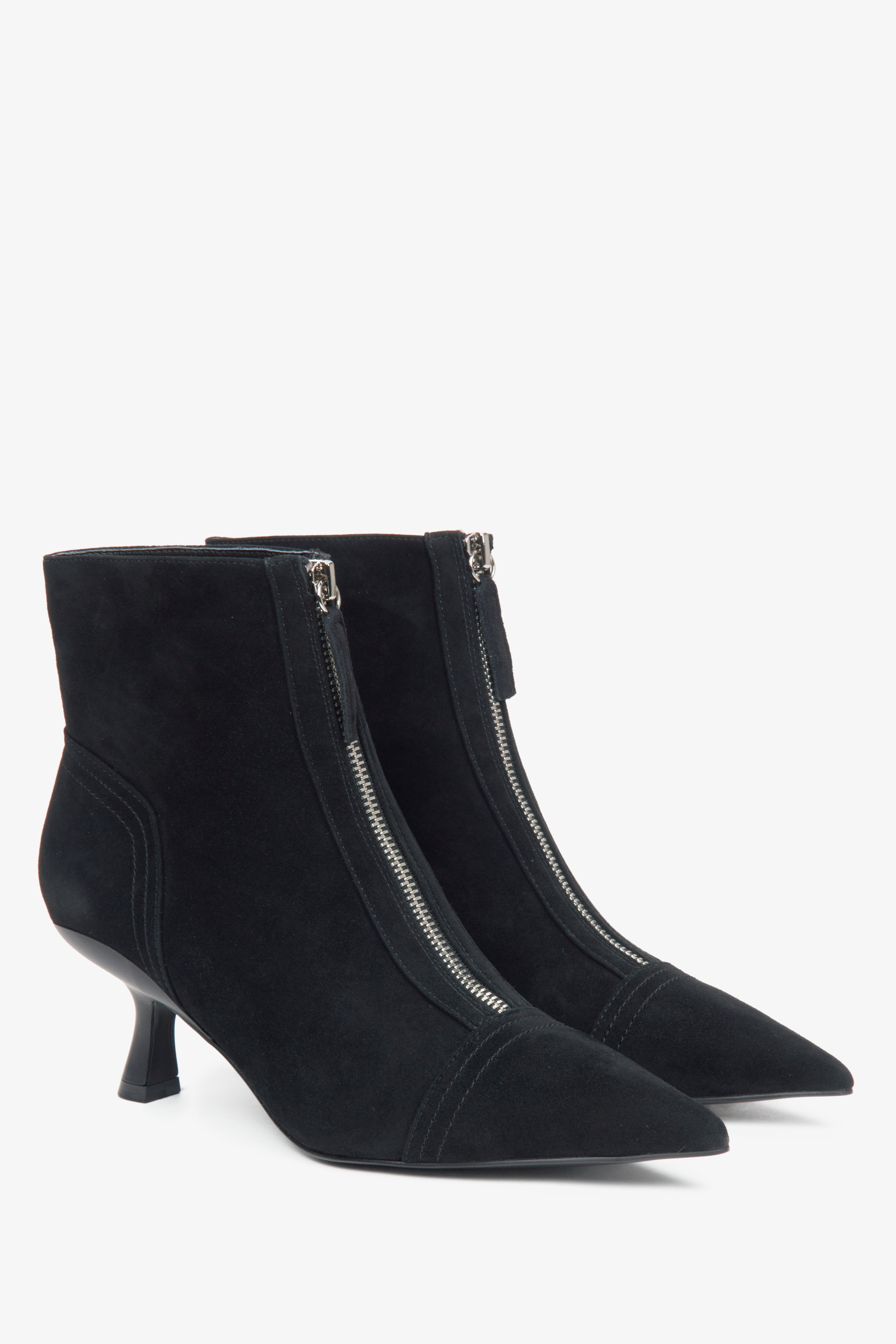 Black women's ankle boots made of natural velour with a low stiletto heel by Estro.